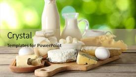  Presentation with dairy products - PPT layouts featuring set of fresh dairy products on wooden table on natural background background and a soft green colored foreground