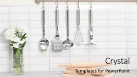  Presentation with kitchen utensils - Audience pleasing slide deck consisting of set of metal kitchen utensils backdrop and a light gray colored foreground