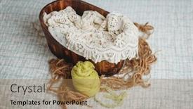  Presentation with newborn baby - PPT theme enhanced with setup-ready-for-newborn-photo background and a coral colored foreground