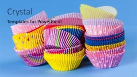  Presentation with muffin - Slide set having several stacks of colorful muffin or cupcake cups on blue background background and a teal colored foreground