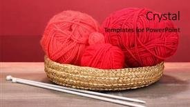  Presentation with yarns - Slide set with sewing needle - red knittings yarns in basket background and a red colored foreground