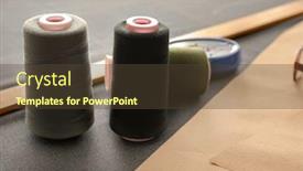  Presentation with sewing - Audience pleasing theme consisting of sewing-threads-on-table-closeup backdrop and a tawny brown colored foreground