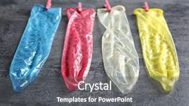  Presentation with transmitted disease - Theme with sexually transmitted disease - colorful condoms on grey background background and a gray colored foreground