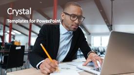  Presentation with monitor computer - PPT layouts enhanced with sheduling - young concentrated employee looking background and a tawny brown colored foreground