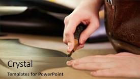  Presentation with leather shoes - Amazing PPT layouts having shoemaker cutting leather backdrop and a coral colored foreground