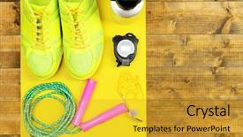  Presentation with sports shoes - Beautiful slide deck featuring shoes and sports equipment on mat on wooden floor top view backdrop and a gold colored foreground