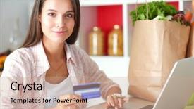  Presentation with online shopping - PPT theme with shopping using tablet and credit background and a coral colored foreground