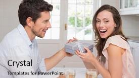  Presentation with giving - Beautiful PPT theme featuring side view of a young man giving a happy woman gift box at home backdrop and a coral colored foreground