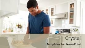  Presentation with recipe - Colorful presentation theme enhanced with side view of african american adult man standing at kitchen worktop preparing food using recipe on a tablet computer close up selective focus backdrop and a mint green colored foreground