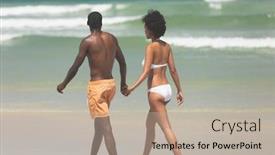  Presentation with ethnic - Amazing PPT theme having side view of cute multi-ethnic couple holding hands and walking at beach on a sunny day backdrop and a mint green colored foreground