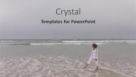  Presentation with splashing - Cool new PPT theme with side view of senior woman splashing wave at beach on a cloudy day backdrop and a light gray colored foreground