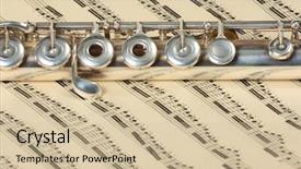  Presentation with music score - PPT theme enhanced with silver flute instrument resting on an old faded music score background and a soft green colored foreground