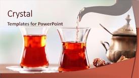  Presentation with black tea - Beautiful presentation design featuring silver service - pouring black tea into glass backdrop and a lemonade colored foreground