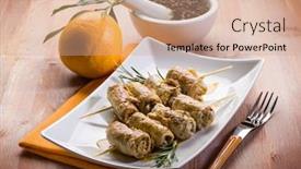  Presentation with clove - Audience pleasing presentation design consisting of skewer rolled up with clove and orange juice backdrop and a coral colored foreground