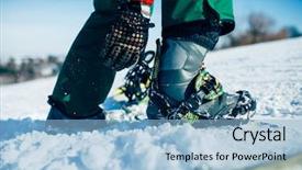  Presentation with snowboard - PPT theme with ski jumping - snowboarder hand fastens snowboard fastening background and a light blue colored foreground