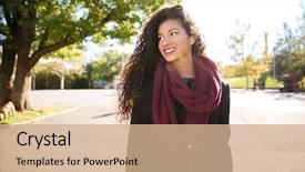  Presentation with look - Amazing PPT theme having portrait of happy young dark skinned curly woman wearing scarf smiling against nature background look aside backdrop and a coral colored foreground