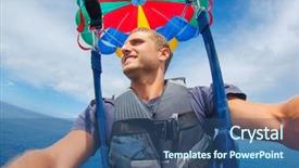  Presentation with parasailing - Amazing PPT theme having skydiving - parasailing over ocean in hawaii backdrop and a ocean colored foreground