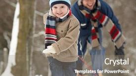  Presentation with children - Presentation theme enhanced with sleigh ride - children pulling sledge through winter background and a gray colored foreground
