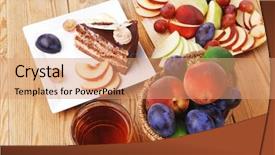  Presentation with table grape - Presentation design having slice of chocolate cream brownie cake topped with white chocolate and cream flowers with hot tea mug decorated with fruits apple plum and grape on plate on wooden table background and a coral colored foreground