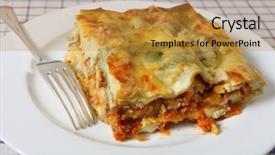  Presentation with spinach - Presentation featuring slice of lasagne verde spinach lasagna on a plate with a fork seen closeup background and a gold colored foreground