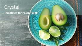  Presentation with lemon lime - Slide set enhanced with sliced avocado and lemon lime on wooden background background and a seafoam green colored foreground