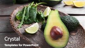  Presentation with avocado - PPT theme consisting of sliced avocado with lime spinach and arugula on wooden plate background and a dark gray colored foreground