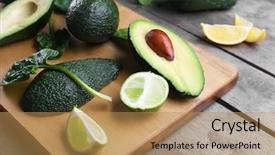  Presentation with lime - PPT theme with sliced avocado with lime and spinach on wooden cutting board background and a coral colored foreground