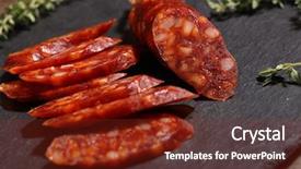  Presentation with chorizo - Presentation theme having sliced chorizo sausage on a slate cutting board background and a tawny brown colored foreground