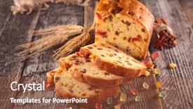  Presentation with cake - Amazing PPT theme having sliced fruits - fruit cake on wood backdrop and a tawny brown colored foreground