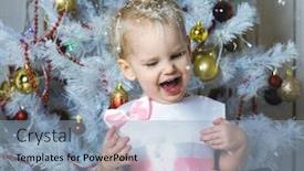  Presentation with child tree - Slides enhanced with small child in a beautiful dress stands near a christmas tree and tries to catch snowflakes in the open mouth background and a light blue colored foreground
