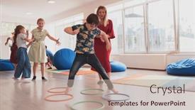  Presentation with school-children - Presentation theme having small-nursery-school-children background and a mint green colored foreground