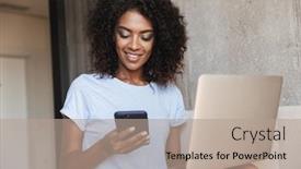  Presentation with mobile home - PPT theme featuring smiling african woman using mobile phone while sitting with laptop computer on a couch at home background and a coral colored foreground