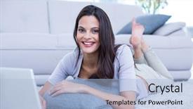  Presentation with living room - PPT theme with smiling beautiful brunette lying on the floor and using her laptop in the living room working from home in quarantine lockdown social distancing self isolation background and a light blue colored foreground