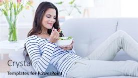  Presentation with living room - Beautiful slide set featuring smiling beautiful brunette relaxing on the couch and eating salad in the living room backdrop and a light blue colored foreground