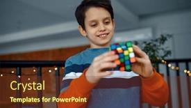  Presentation with cube - Presentation theme consisting of smiling-boy-holds-puzzle-cube background and a tawny brown colored foreground
