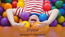  Presentation with cannon ball into pool - Audience pleasing PPT theme consisting of smiling boy in sponge ball backdrop and a gold colored foreground