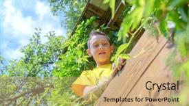  Presentation with smiling kids at summer camp - PPT theme having smiling boy on treehouse summer background and a  colored foreground