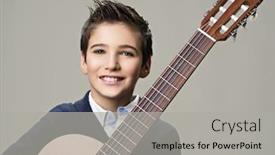  Presentation with acoustic - Audience pleasing PPT theme consisting of smiling boy with guitar teenager boy with classic wooden acoustic guitar backdrop and a light gray colored foreground
