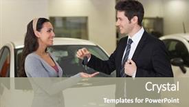  Presentation with car key - PPT theme having smiling businessman giving car key to happy customer at new car showroom background and a gray colored foreground