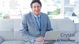  Presentation with social isolation - Slide deck enhanced with smiling businessman using his laptop on couch in living room working from home in quarantine lockdown social distancing self isolation background and a light blue colored foreground