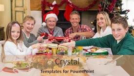  Presentation with living room family - Amazing PPT theme having smiling family pulling christmas crackers at the dinner table at home in the living room backdrop and a coral colored foreground