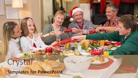  Presentation with living room family - Slides featuring smiling family pulling christmas crackers at the dinner table at home in the living room background and a coral colored foreground