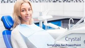  Presentation with dentistry - PPT theme with smiling girl sitting in dentistry cabinet background and a sky blue colored foreground