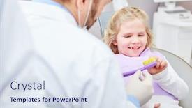  Presentation with pediatric dentist - Cool new slide deck with smiling girl with toothbrush gets tips to brush her teeth from the pediatric dentist backdrop and a sky blue colored foreground