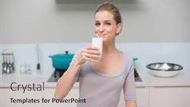  Presentation with looking glass - Slide deck having smiling gorgeous model looking at camera drinking glass of milk standing in kitchen background and a coral colored foreground