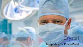  Presentation with surgery room - Presentation design enhanced with smiling male surgeon in uniform with mask in surgery room with assistent background and a light blue colored foreground