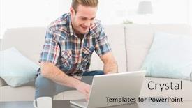  Presentation with social isolation - PPT layouts having smiling man at home on a laptop sitting on a sofa with a mug working from home in quarantine lockdown social distancing self isolation background and a light gray colored foreground