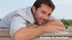  Presentation with man sitting bench - Amazing PPT theme having smiling-man-on-a-bench backdrop and a coral colored foreground