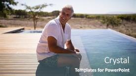  Presentation with pool side - Colorful PPT layouts enhanced with smiling man sitting near pool side during safari vacation backdrop and a seafoam green colored foreground