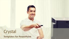  Presentation with man watching woman preparing vegetables - Audience pleasing slide set consisting of smiling man with remote control backdrop and a  colored foreground